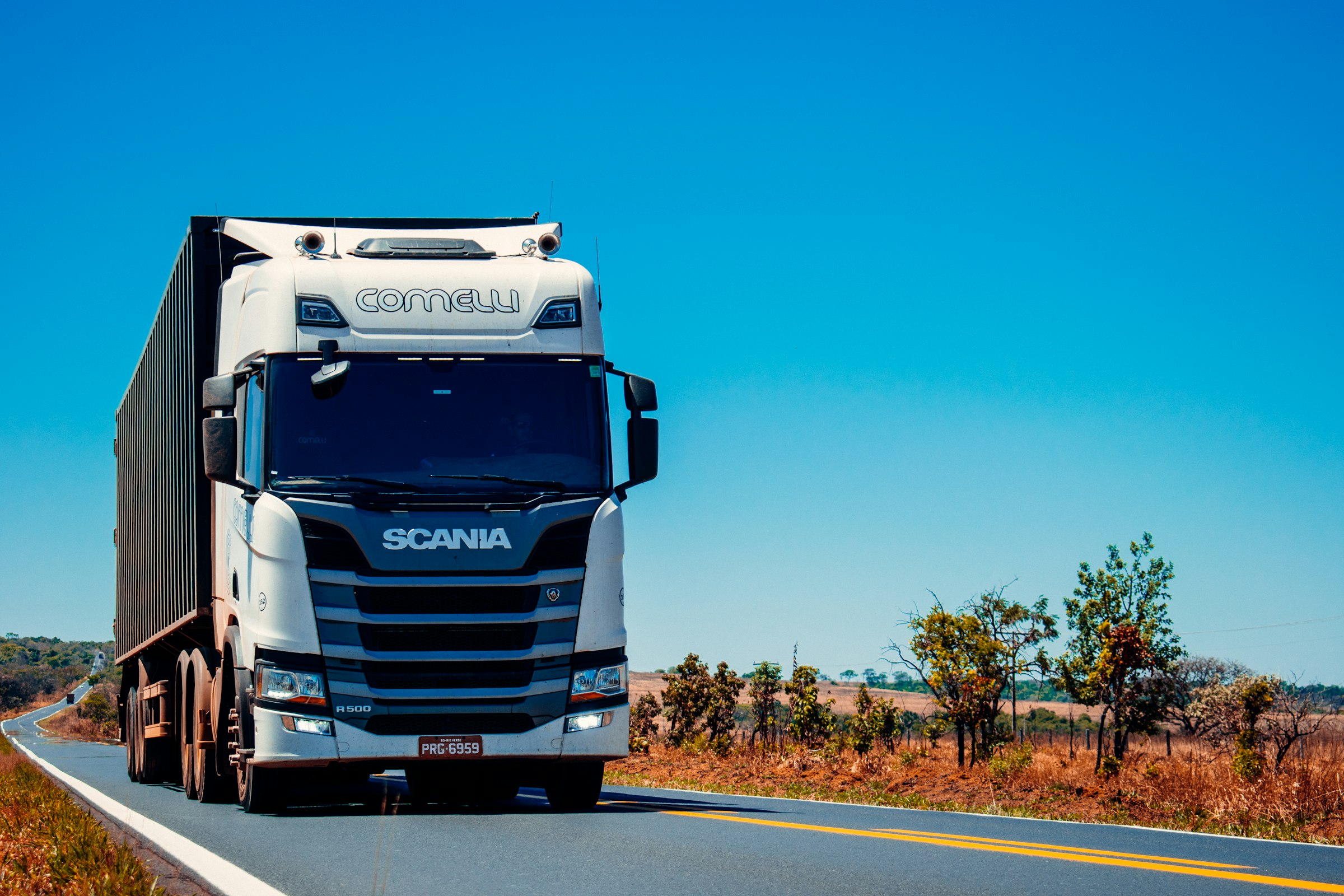 Commercial truck driving on an open highway